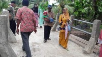 Secara Bertahap, Desa Kuala Gaung 'Sulap' Jembatan Kayu Jadi Jembatan Beton